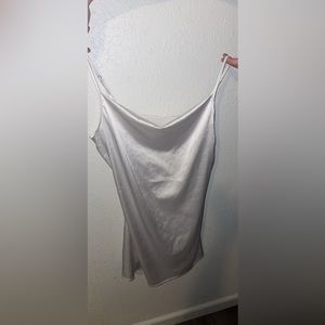 white silk dress. it’s supposed to be a petite coat but i wore it as a dress